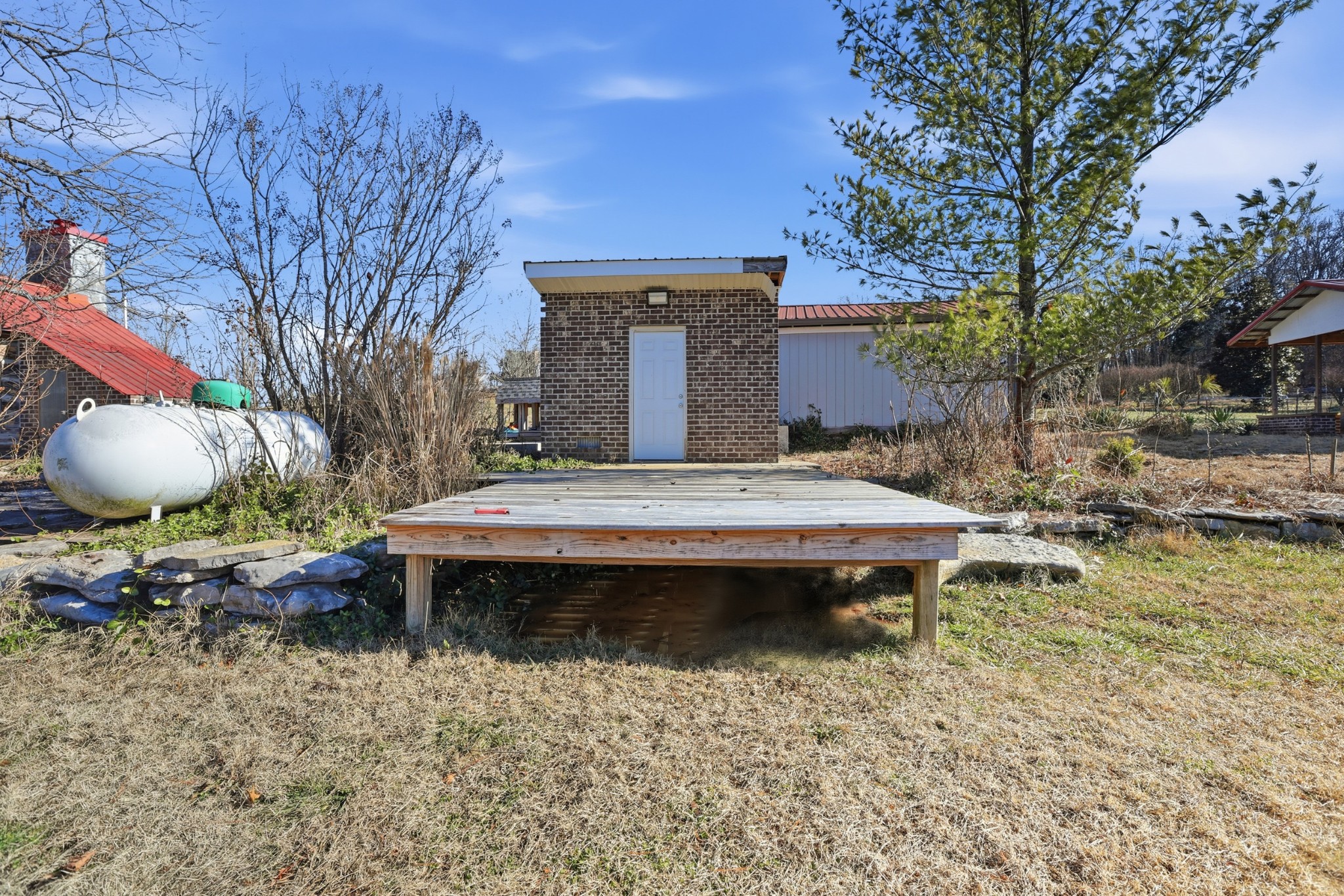 2160 Cedar Grove Road Lebanon, TN 37087 - Photo 64 of 100 a backyard of a house with table and chairs