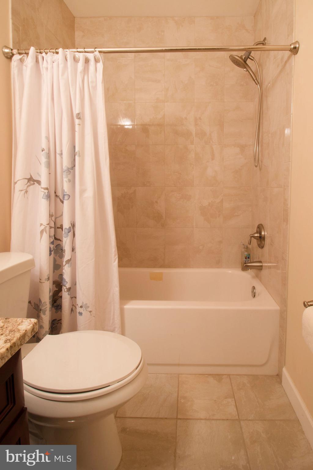 9599 Elihu Hill Road Marshall, VA 20115 - Photo 18 of 21 Bath with tile shower and floor