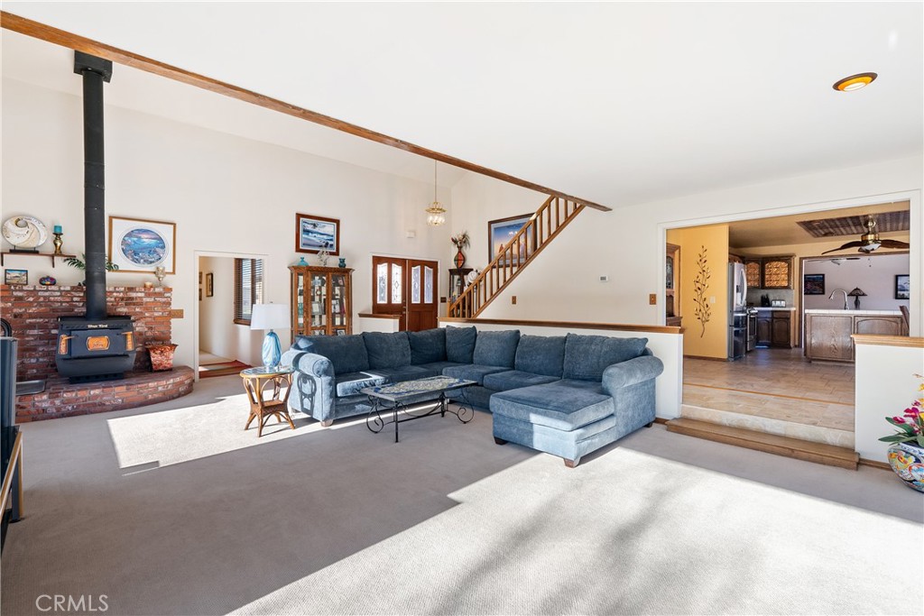 5145 Northfork Place Paso Robles, CA 93446 - Photo 13 of 62 a living room with furniture and a wooden floor
