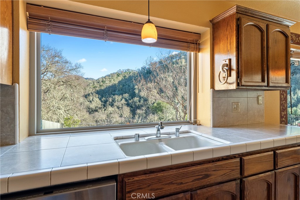 5145 Northfork Place Paso Robles, CA 93446 - Photo 17 of 62 a view of a sink and a mirror