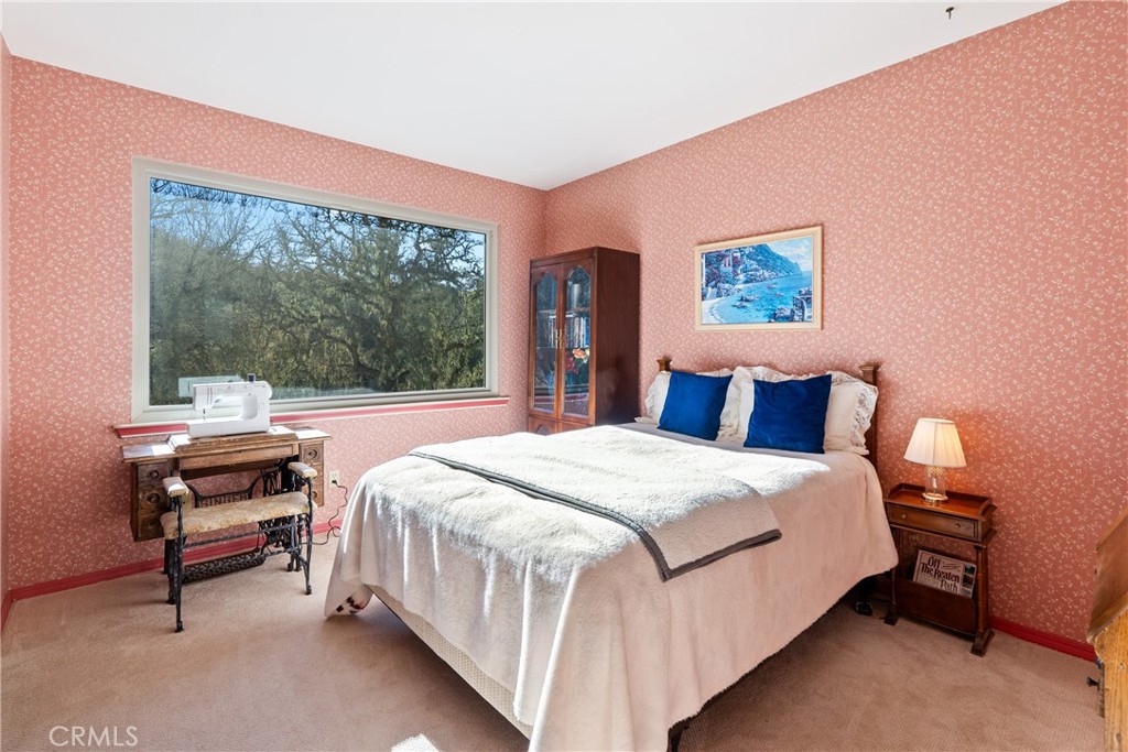 5145 Northfork Place Paso Robles, CA 93446 - Photo 31 of 62 a bedroom with a bed and a large window