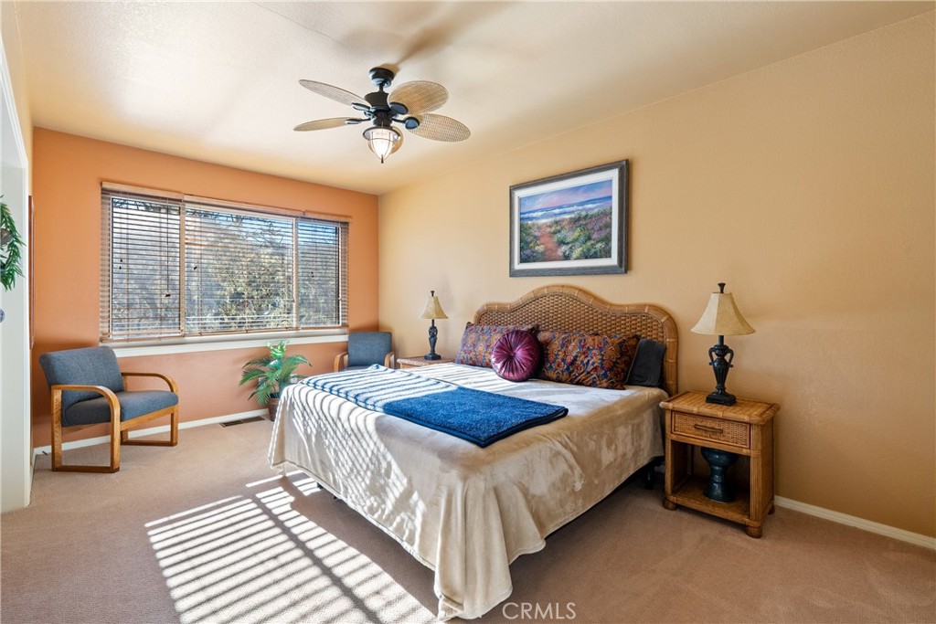 5145 Northfork Place Paso Robles, CA 93446 - Photo 32 of 62 a bedroom with a bed and a large window