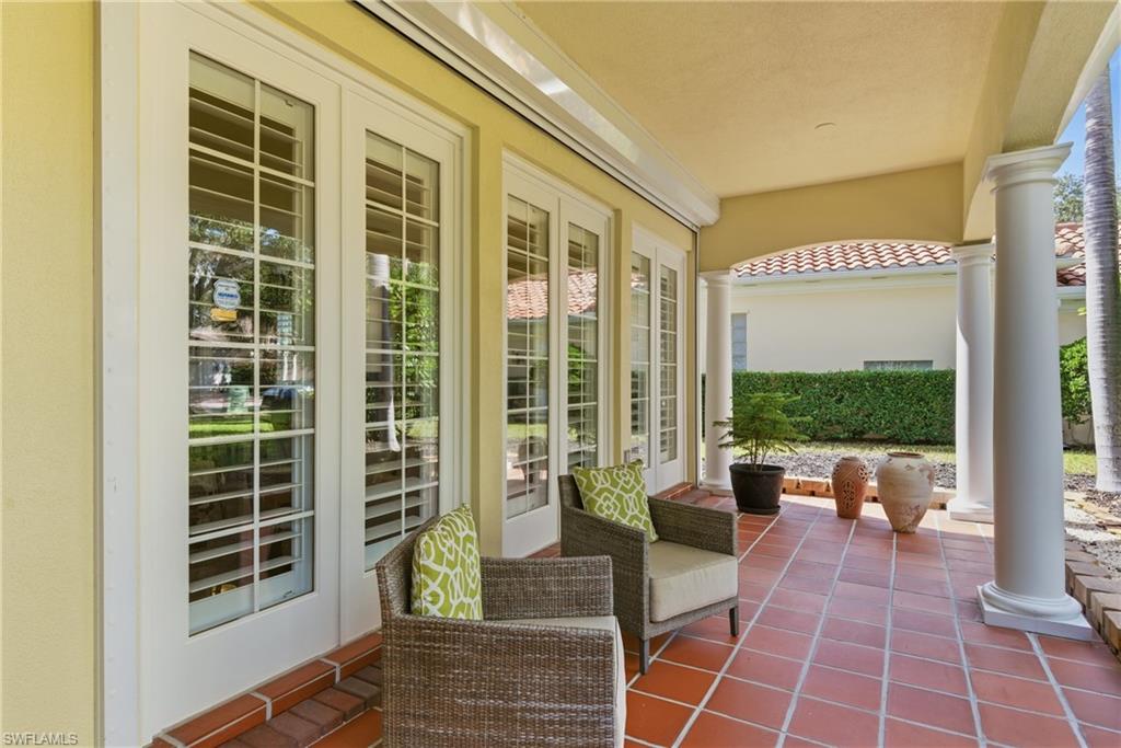 3928 Upolo Lane Naples, FL 34119 - Photo 2 of 33 front porch