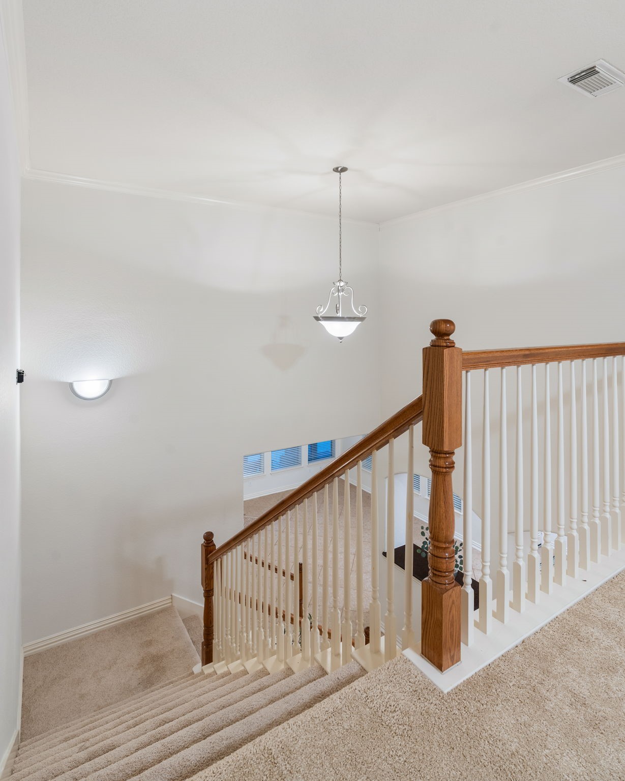 307 Arbor Ridge Lane Conroe, TX 77384 - Photo 25 of 50 a view of staircase with railing and white walls