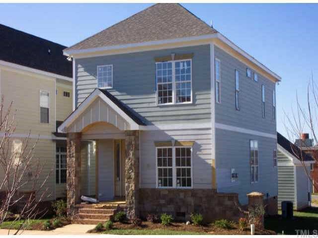 1159 Harp Street Raleigh, NC 27604 - Photo 1 of 1 a front view of a house with a yard