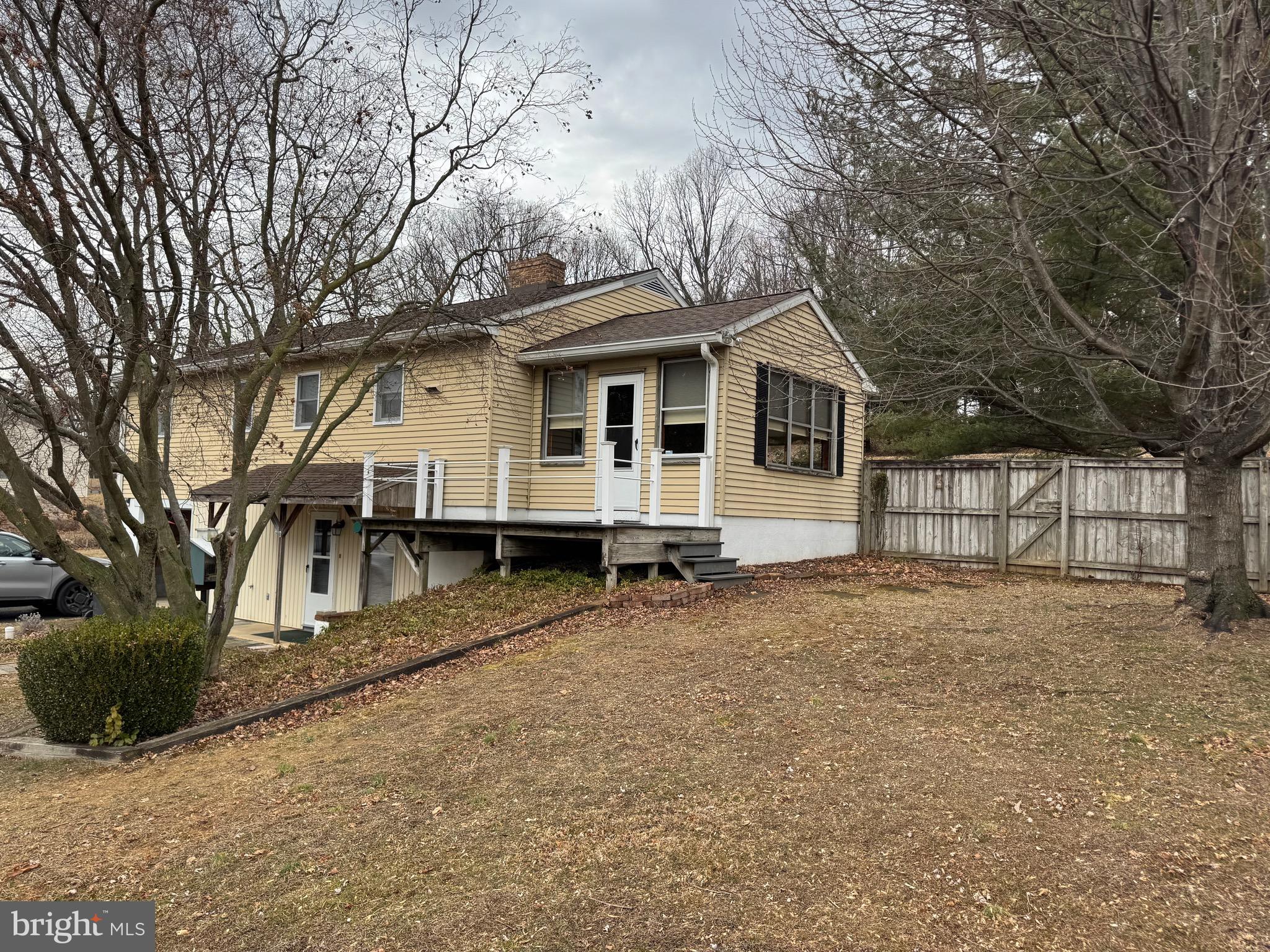 1009 Dry Wells Road Quarryville, PA 17566 - Photo 2 of 17 a house with trees in the background