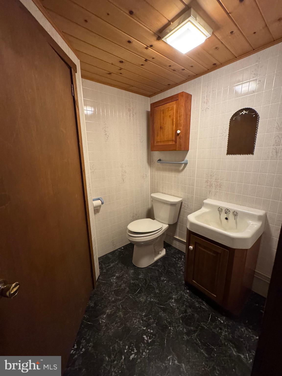 1009 Dry Wells Road Quarryville, PA 17566 - Photo 6 of 17 a bathroom with a toilet sink and mirror