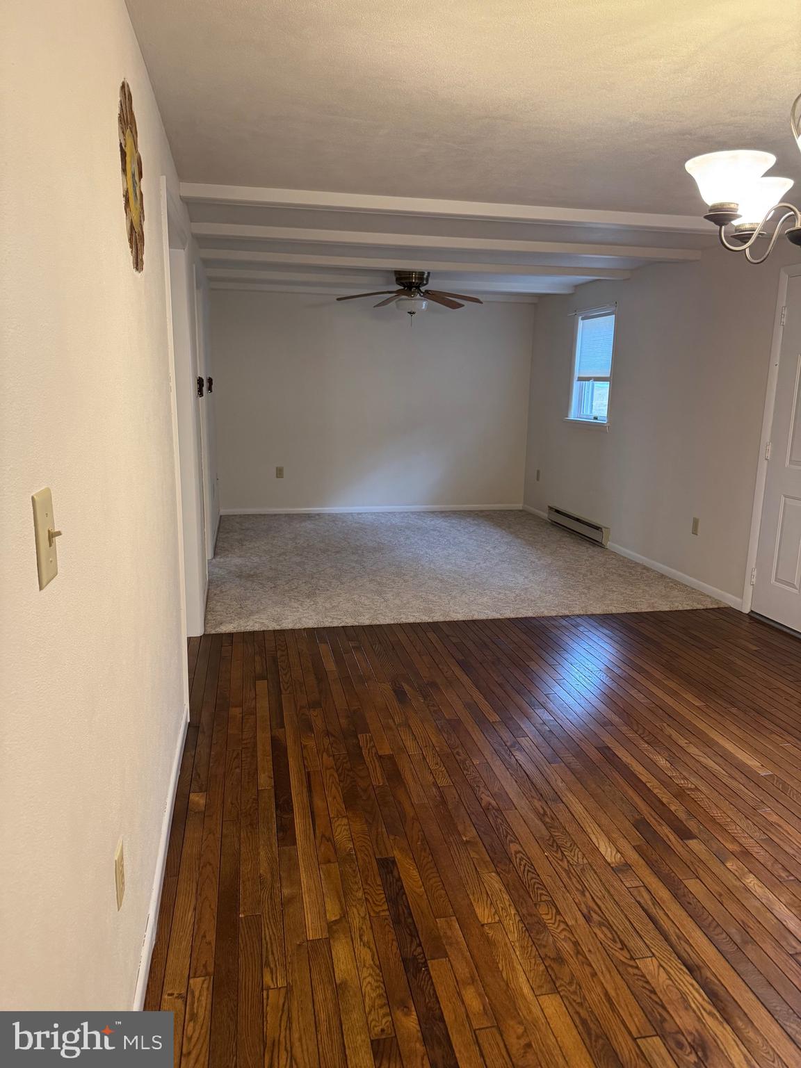 1009 Dry Wells Road Quarryville, PA 17566 - Photo 9 of 17 a view of a room with wooden floor and staircase