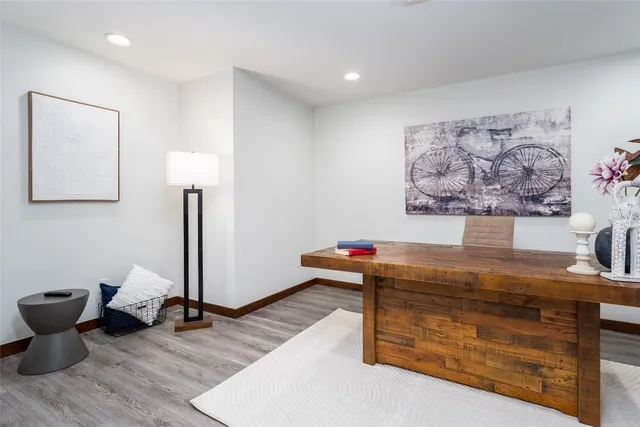 a room with furniture and wooden floor