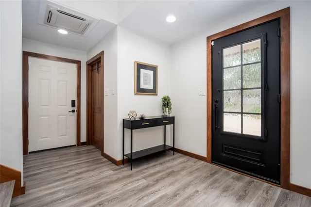a kitchen with stainless steel appliances granite countertop a stove and a refrigerator