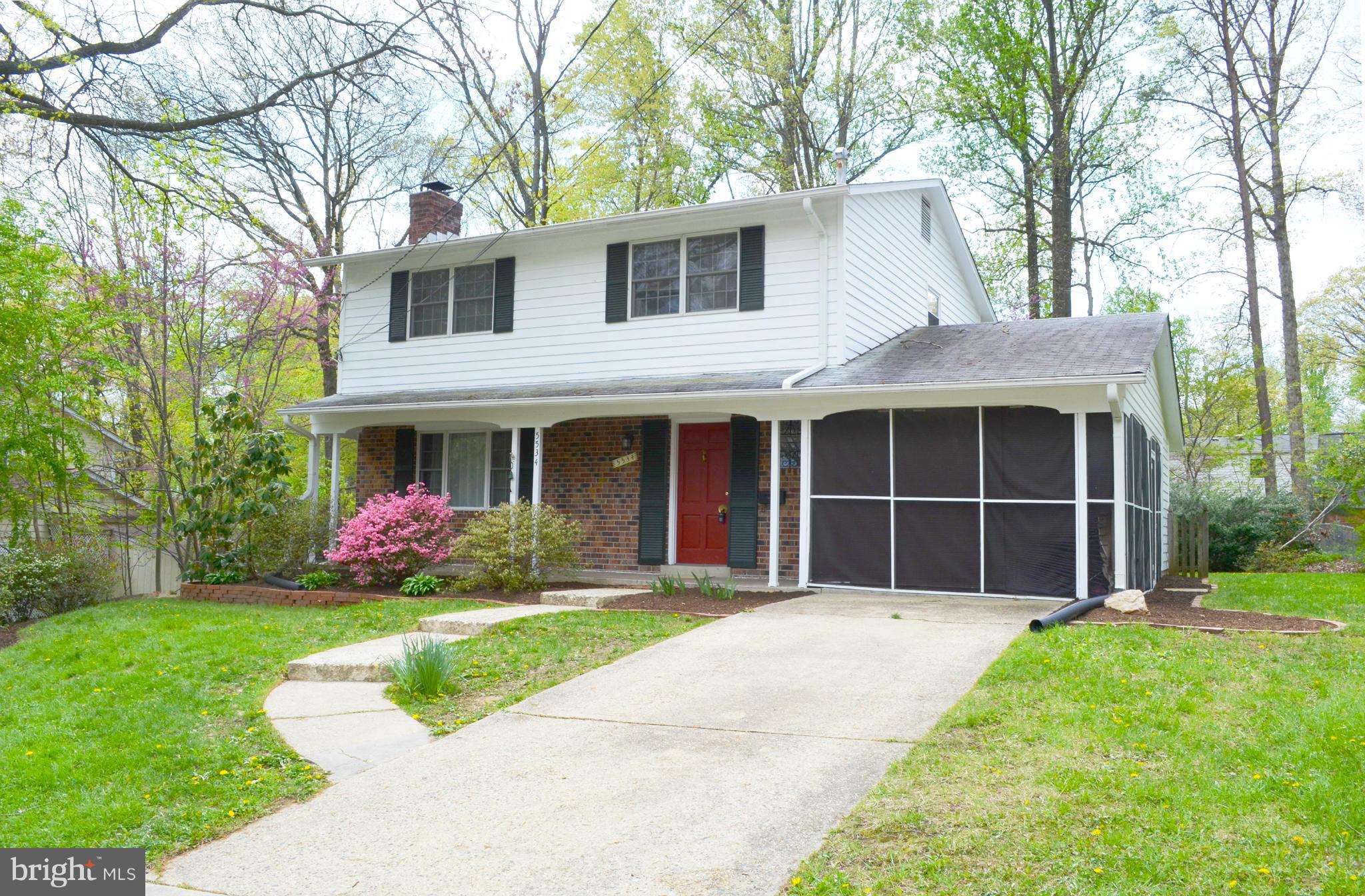 5534 Callander Drive Springfield, VA 22151 - Photo 2 of 20 a front view of a house with a yard and porch