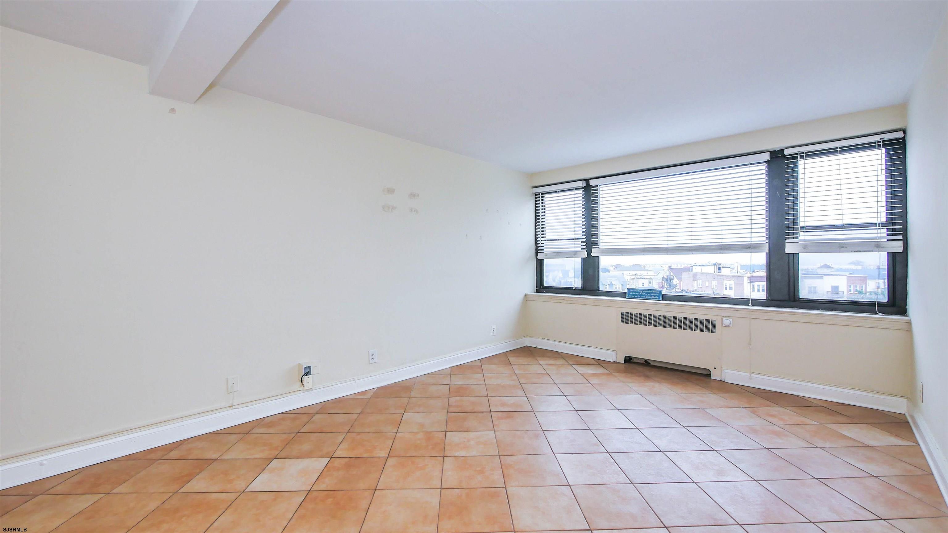 101 South Raleigh Avenue, Unit 521 Atlantic City, NJ 08401 - Photo 10 of 27 a view of an empty room with a window