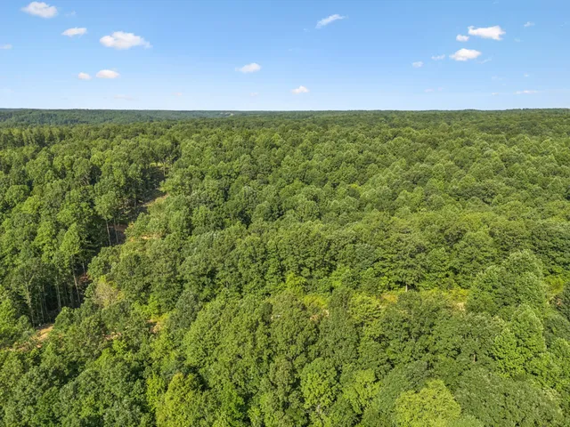 a view of an empty room and a sink