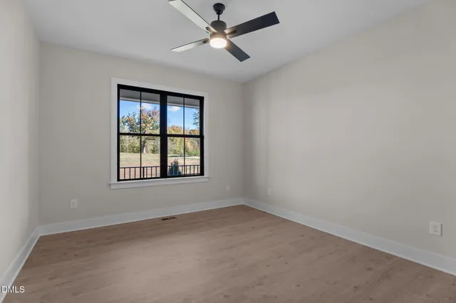 a bathroom with a bathtub a toilet and a shower