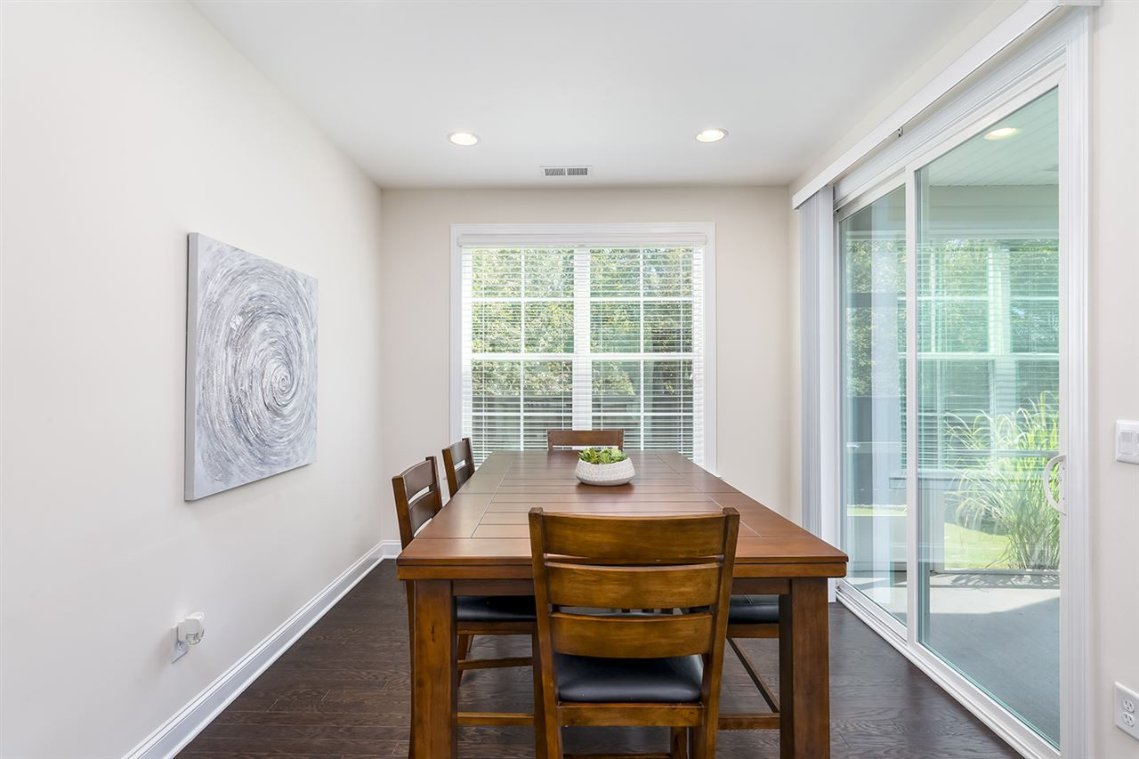 312 Morgan Ridge Road Holly Springs, NC 27540 - Photo 8 of 30 Breakfast Area with Access to the Screened Porch