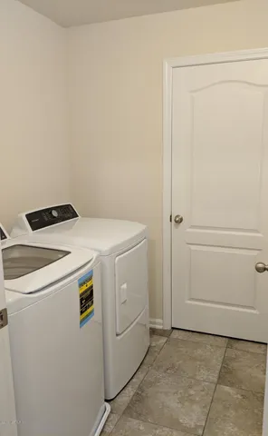 a view of a room that has a window