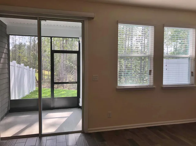 a view of house with yard