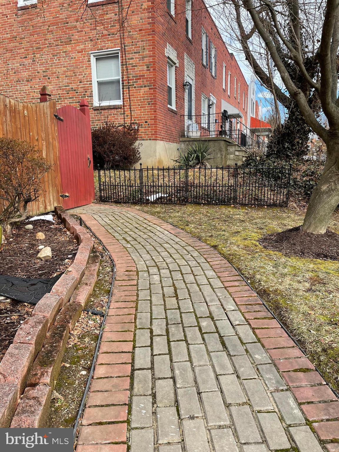 8650 Oak Road Baltimore, MD 21234 - Photo 3 of 41 Brick sidewalk to side gate