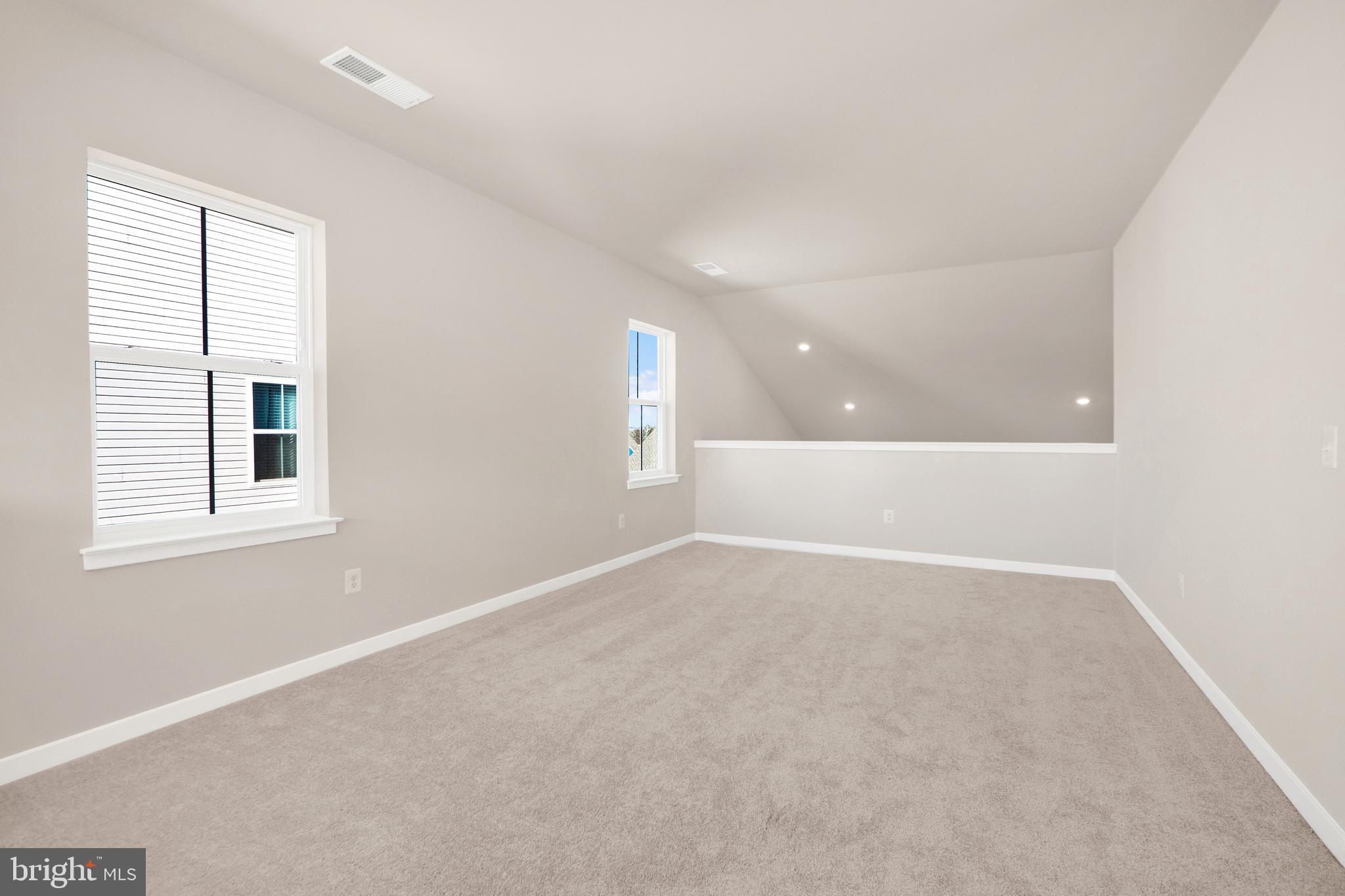 493 Mountain Laurel Boulevard Ranson, WV 25438 - Photo 11 of 27 an empty room with windows