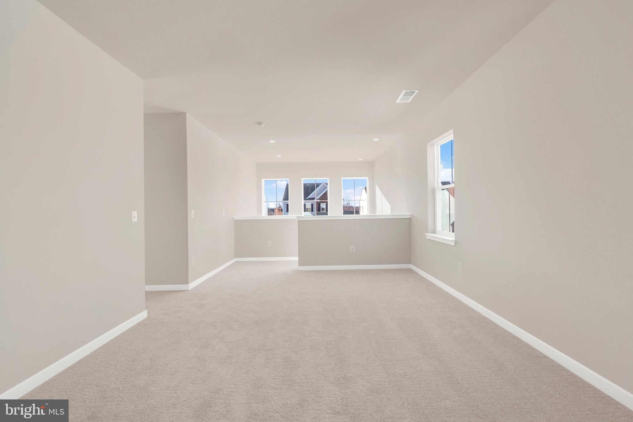 493 Mountain Laurel Boulevard Ranson, WV 25438 - Photo 12 of 27 a view of an empty room with a window