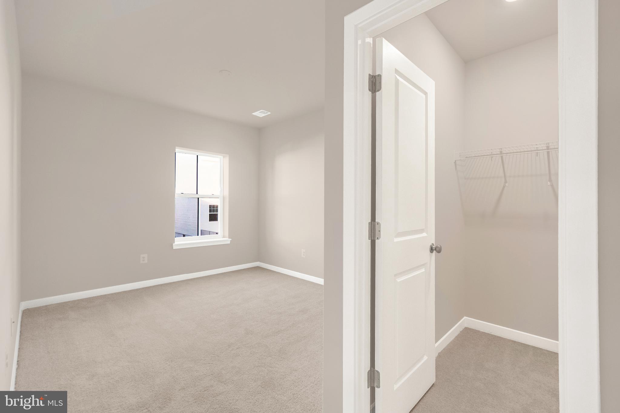 493 Mountain Laurel Boulevard Ranson, WV 25438 - Photo 25 of 27 a view of an empty room with a window