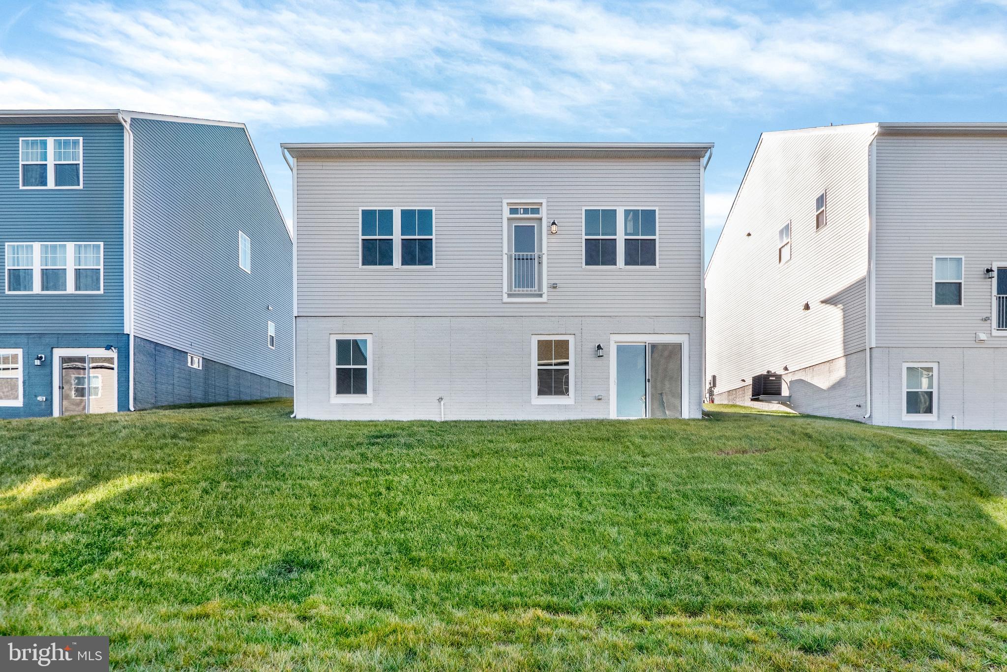 493 Mountain Laurel Boulevard Ranson, WV 25438 - Photo 27 of 27 a house view with a garden space