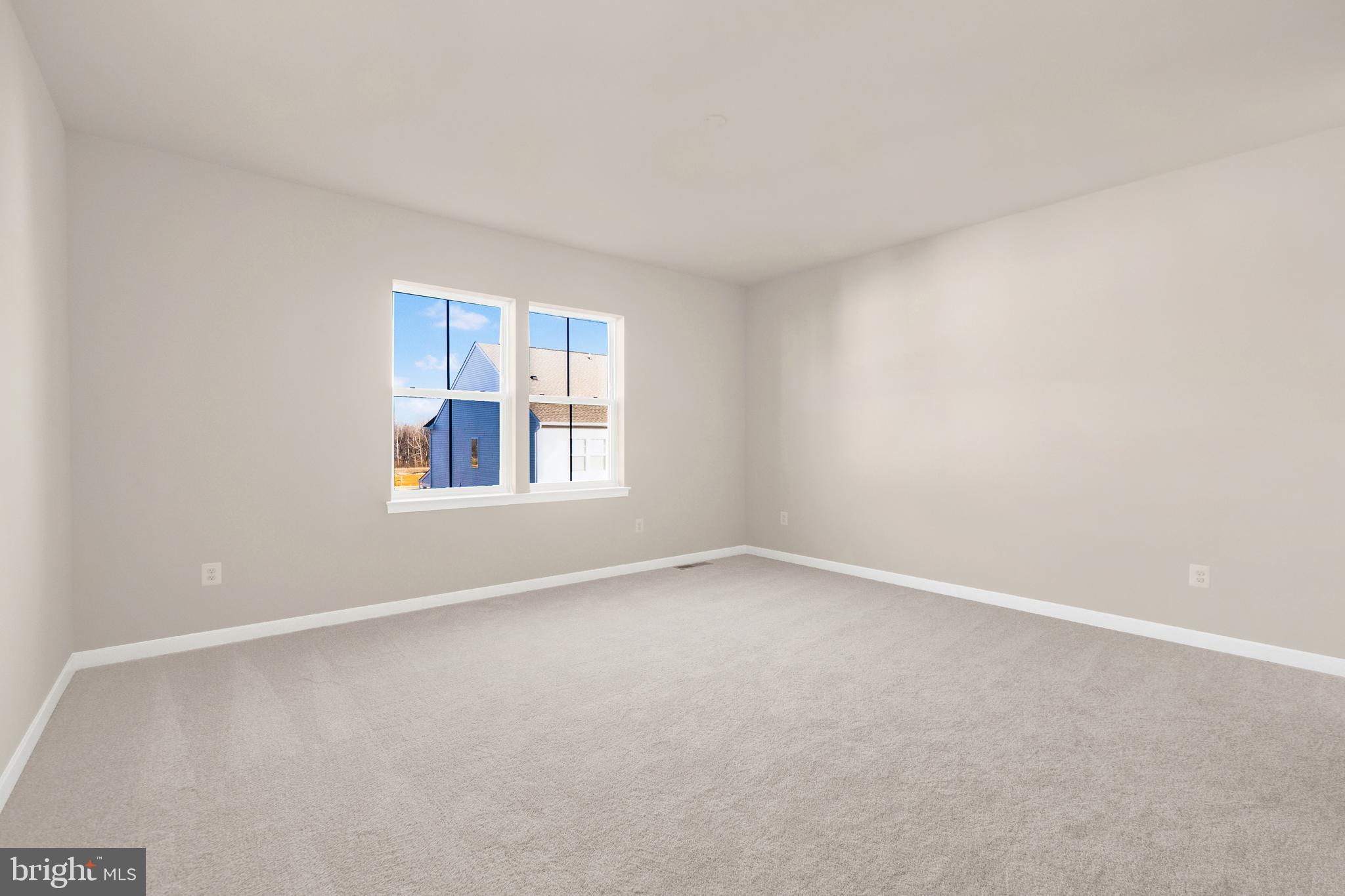493 Mountain Laurel Boulevard Ranson, WV 25438 - Photo 8 of 27 an empty room with windows