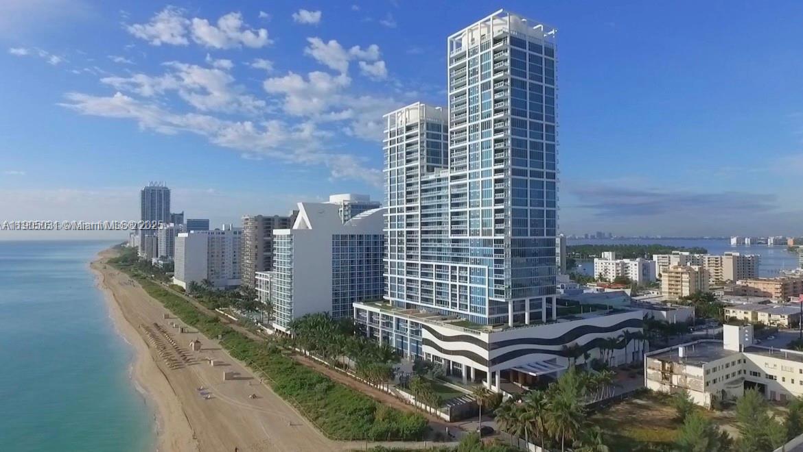 6899 Collins Avenue, Unit 1709 Miami Beach, FL 33141 - Photo 1 of 18 a view of a city with tall buildings