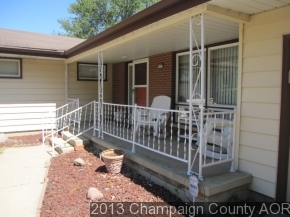 2332 Brookshire East Champaign, IL 61821 - Photo 2 of 15 a view of a balcony with a potted plant