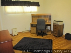 2332 Brookshire East Champaign, IL 61821 - Photo 13 of 15 a room with a bed and a window