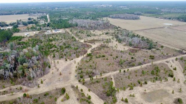 an aerial view of mountain with beach
