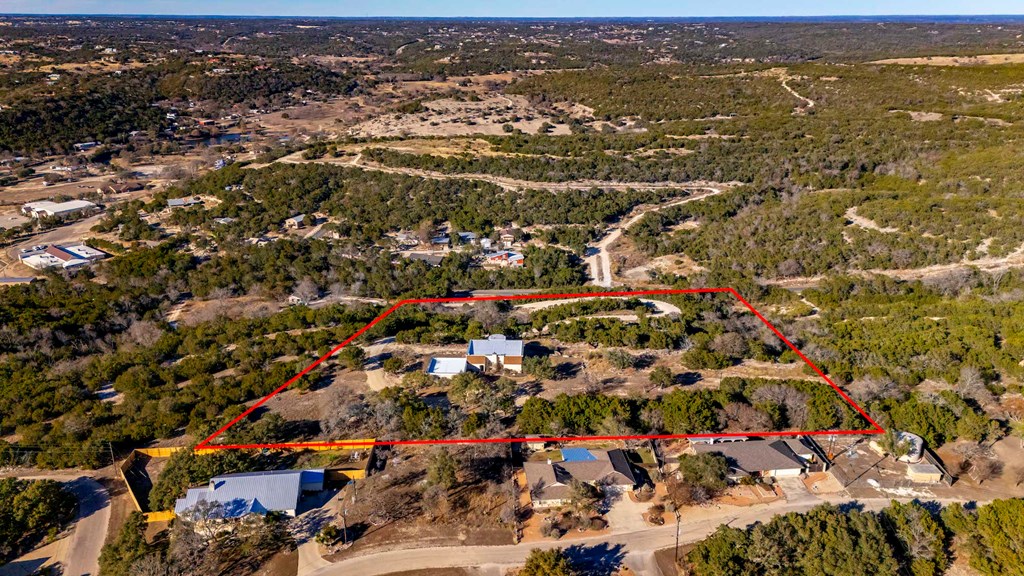 157 McCullough Ranch Road Kerrville, TX 78028 - Photo 26 of 75 an aerial view of residential building with parking space