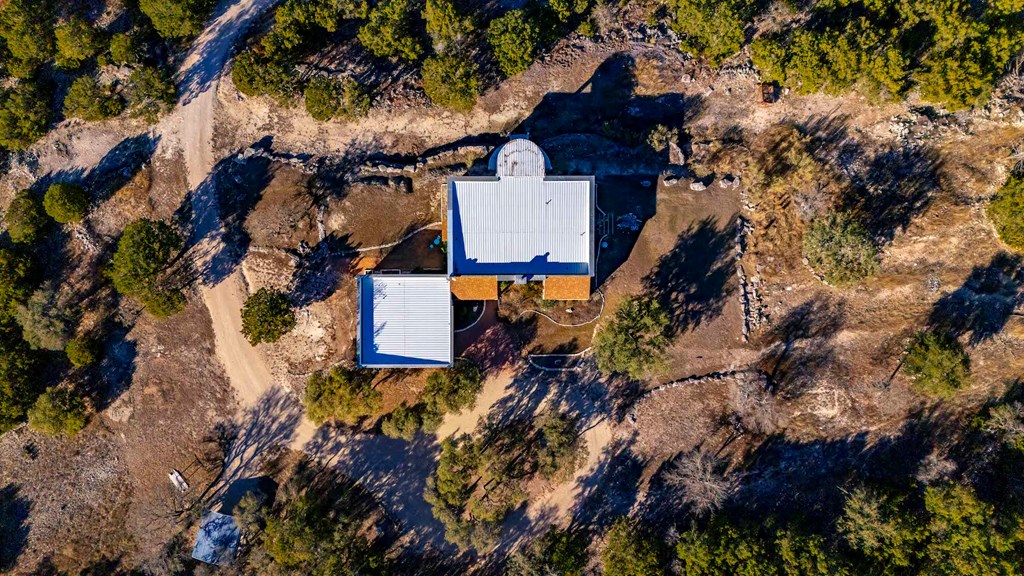 157 McCullough Ranch Road Kerrville, TX 78028 - Photo 27 of 75 an aerial view of a house with a yard