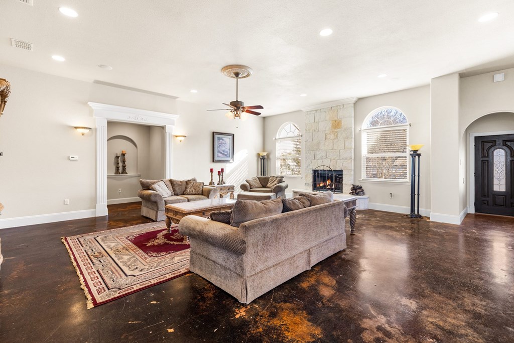 157 McCullough Ranch Road Kerrville, TX 78028 - Photo 31 of 75 a living room with furniture and a wooden floor