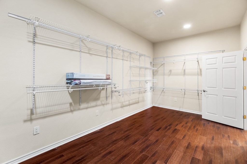 157 McCullough Ranch Road Kerrville, TX 78028 - Photo 46 of 75 a view of a kitchen with wooden floor
