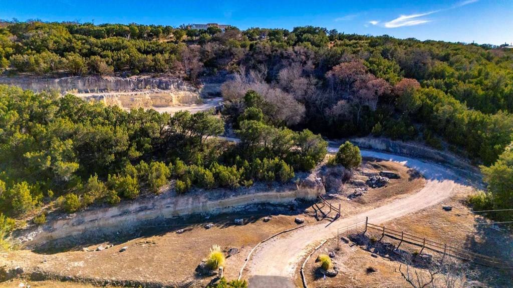 157 McCullough Ranch Road Kerrville, TX 78028 - Photo 5 of 75 an aerial view of a house with a yard