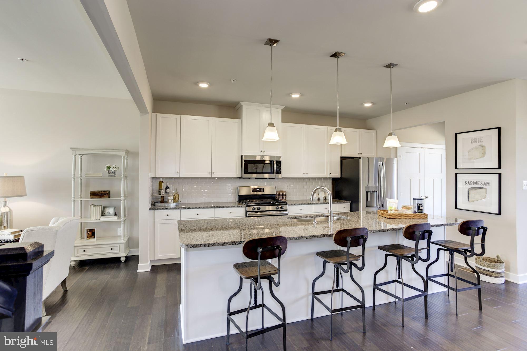 14933 Ring House Road, Unit C Brandywine, MD 20613 - Photo 3 of 17 KITCHEN WITH LARGE CENTER ISLAND