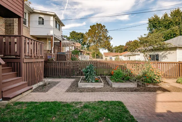 a view of a wrought iron fences in front of house