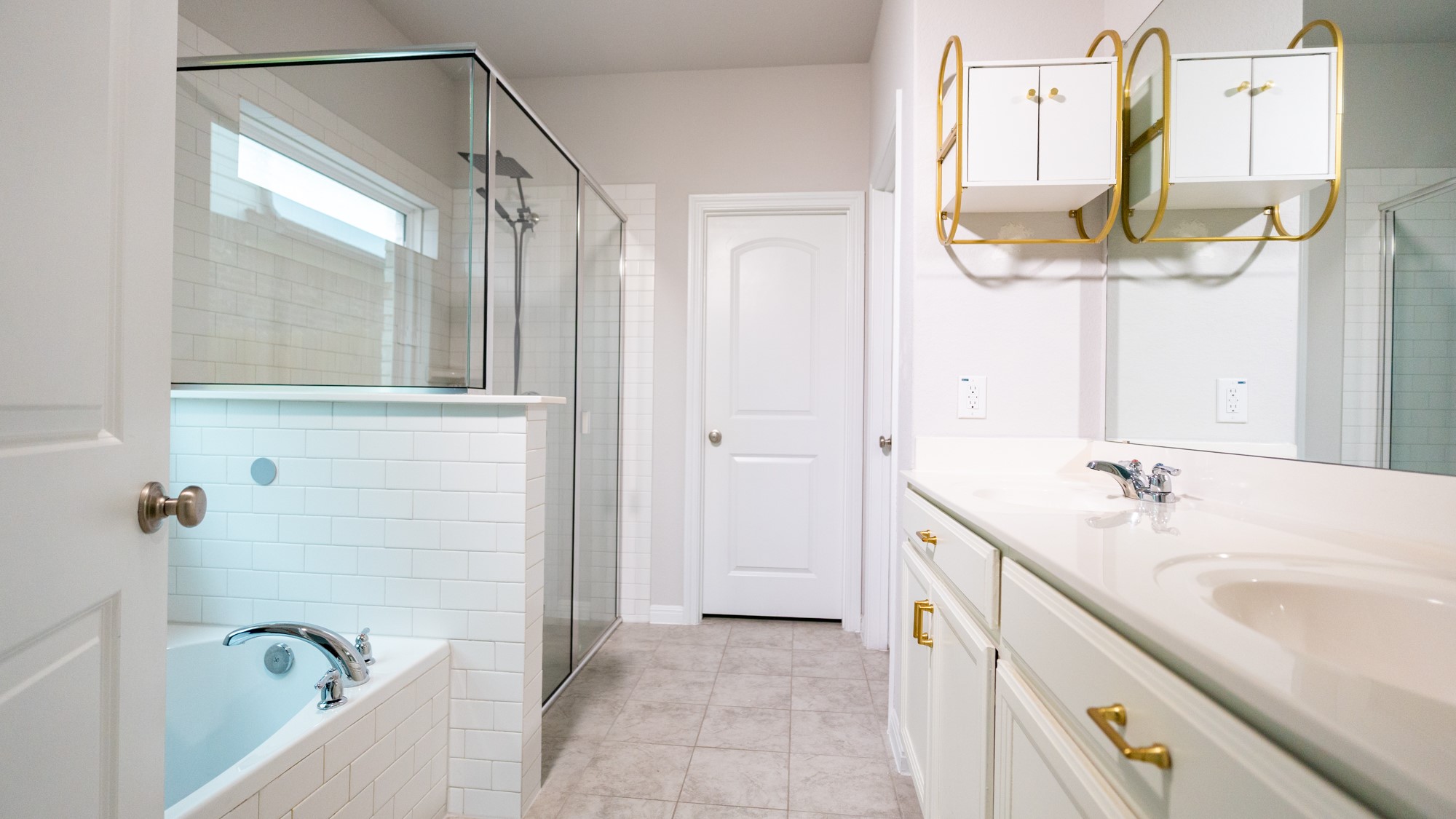 13108 Chapala Way Manor Manor, TX 78653 - Photo 16 of 36 a bathroom with a sink and a mirror