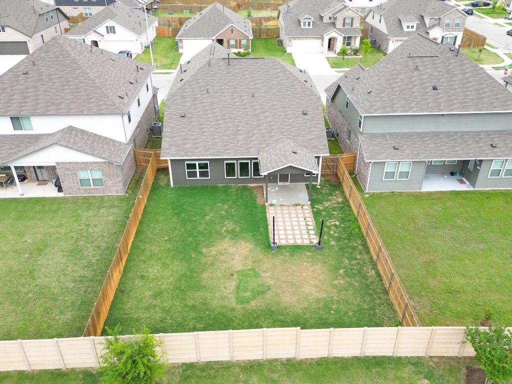 13108 Chapala Way Manor Manor, TX 78653 - Photo 35 of 36 a aerial view of a house with swimming pool