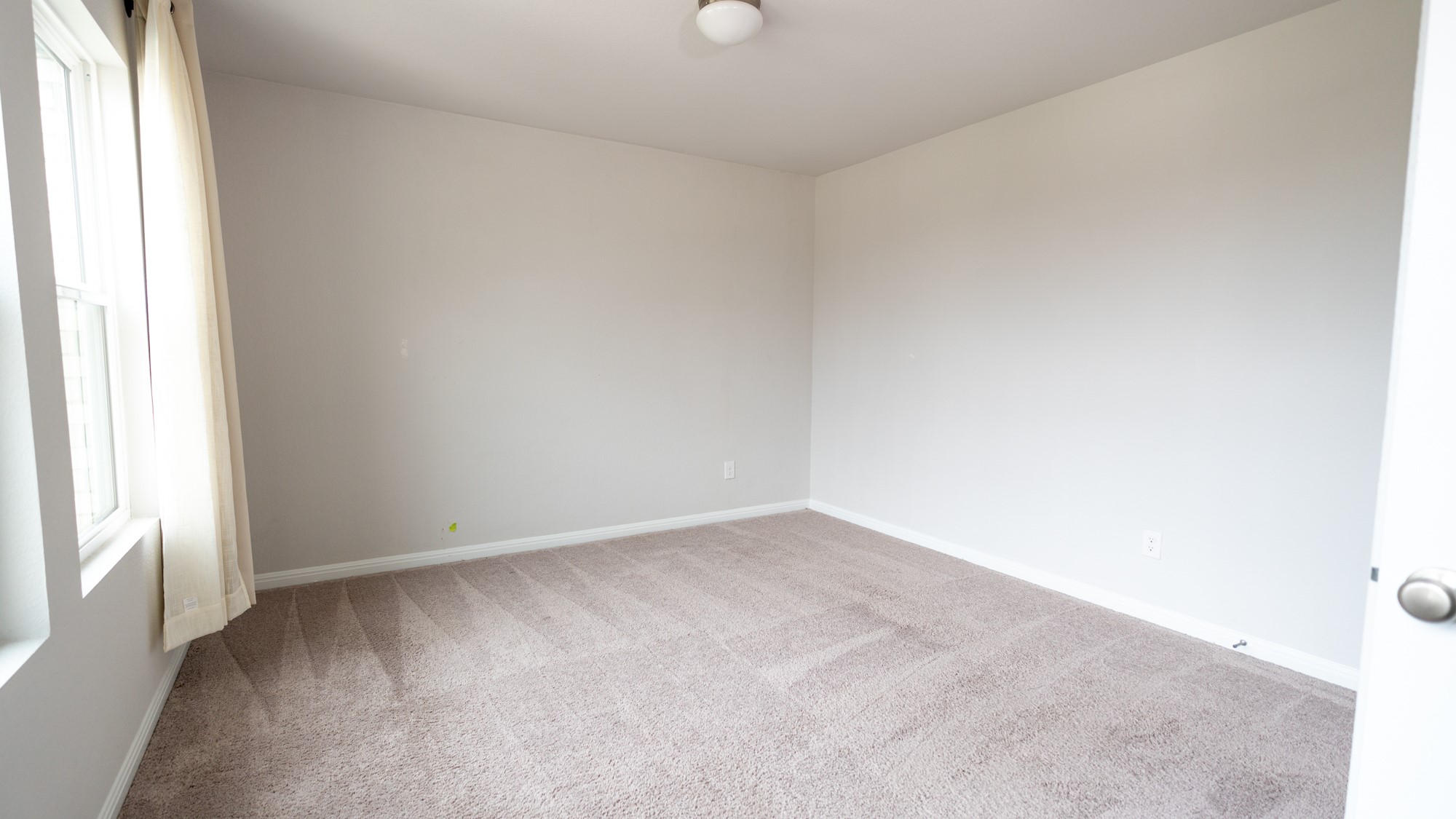 13108 Chapala Way Manor Manor, TX 78653 - Photo 5 of 36 an empty room with windows