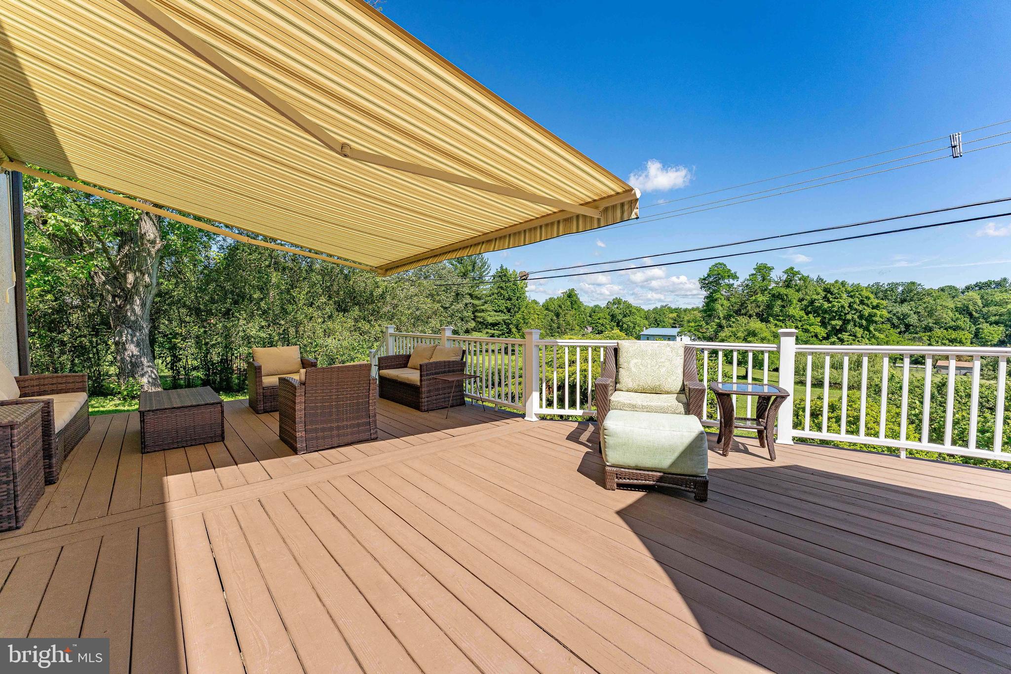 84 North Spring Lane Phoenixville, PA 19460 - Photo 46 of 51 a view of roof deck with chairs and wooden floor