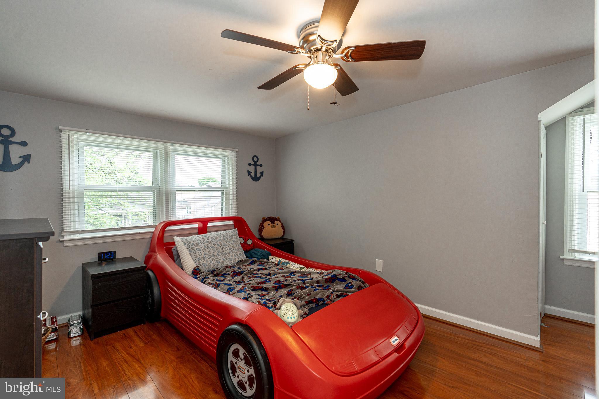 220 Pinewood Road Baltimore, MD 21222 - Photo 20 of 45 a bedroom with a bed and a window