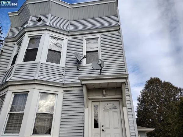 a white building with a large window