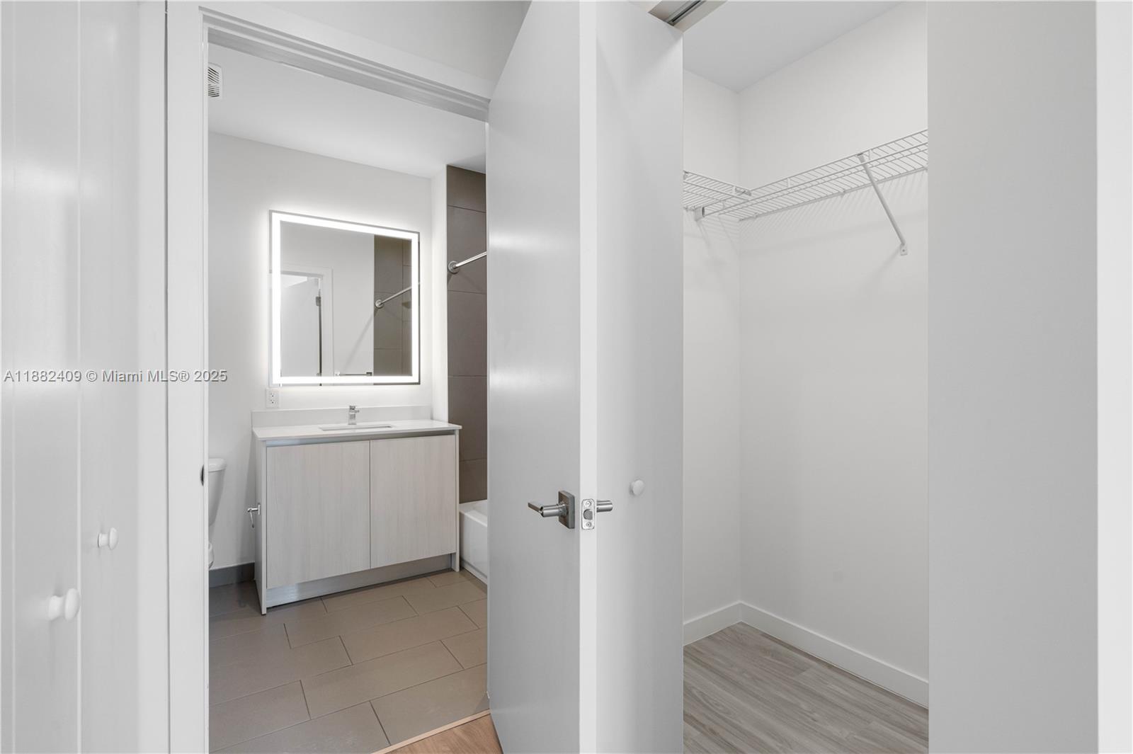 1809 Jackson Street, Unit 709 Hollywood, FL 33020 - Photo 17 of 40 a bathroom with a shower