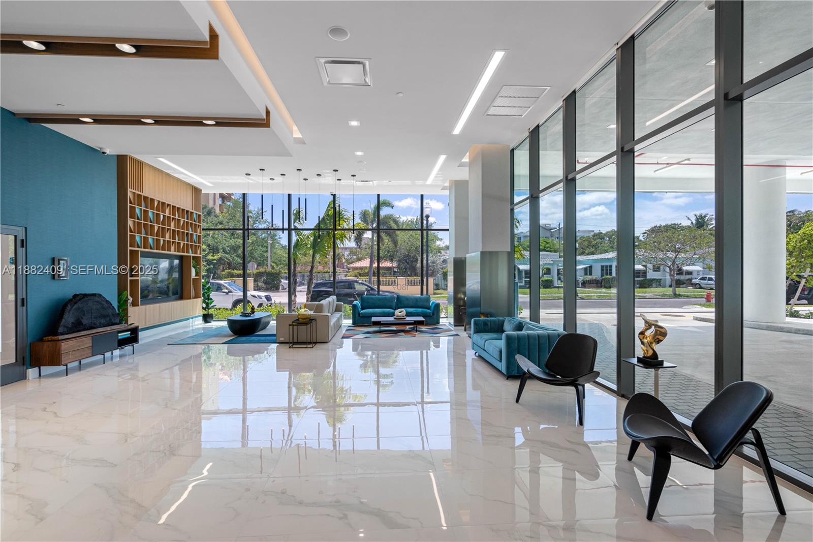1809 Jackson Street, Unit 709 Hollywood, FL 33020 - Photo 39 of 40 a view of a lobby with furniture and floor to ceiling window