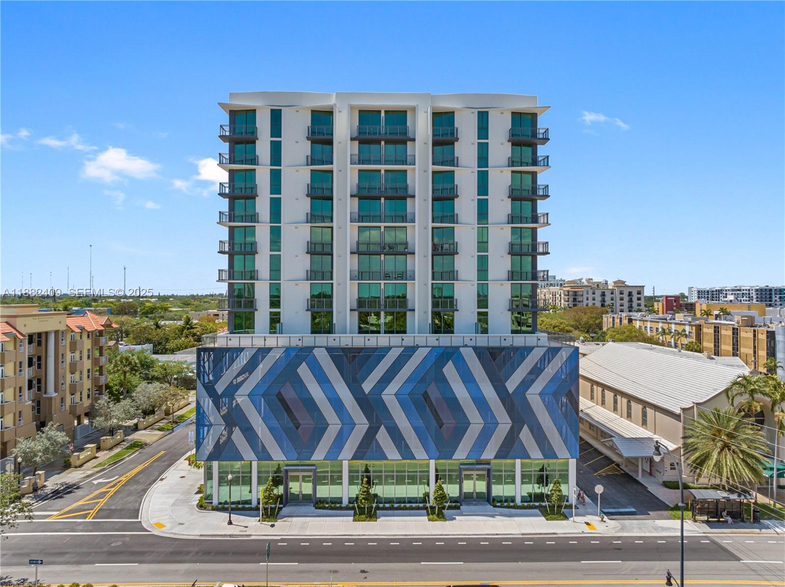 1809 Jackson Street, Unit 709 Hollywood, FL 33020 - Photo 40 of 40 a view of a chairs and table on the terrace