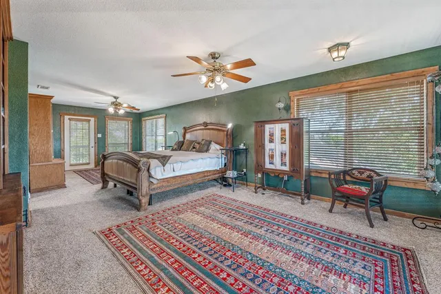 a view of balcony with wooden floor