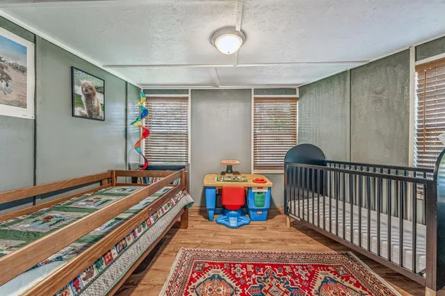 a view of a field with an ocean