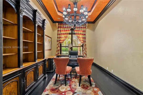 a kitchen with a refrigerator and a sink